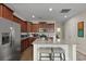 Spacious kitchen with stainless steel appliances, granite countertops, and a breakfast bar at 4143 Rigsby Ln, Charleston, SC 29414