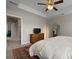 Main bedroom with carpet, ensuite bathroom, and mirror at 4143 Rigsby Ln, Charleston, SC 29414