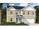 Charming two-story home with a bright teal door and a two car garage at 4163 Rising Tide Dr, Summerville, SC 29485