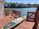 Waterfront deck with red wood and a paddle board at 4735 Arco Ln, North Charleston, SC 29418