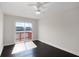 Bedroom with ceiling fan and sliding glass door to a deck with waterfront view at 4735 Arco Ln, North Charleston, SC 29418