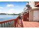 Water view from the home's deck, featuring wooden railings and providing a scenic outdoor space at 4735 Arco Ln, North Charleston, SC 29418