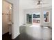 A view from the living room reveals a powder room and sliding glass doors, enhancing its spacious feel at 4735 Arco Ln, North Charleston, SC 29418