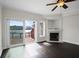 Living room showcasing hardwood floors, fireplace and access to the deck with beautiful views at 4735 Arco Ln, North Charleston, SC 29418