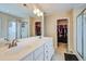Main bath features a double sink vanity, glass shower and walk-in closets at 500 Dolphin Dr, Summerville, SC 29485
