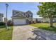 Well-maintained two-story home with a two-car garage and landscaped front yard at 500 Dolphin Dr, Summerville, SC 29485