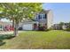 Charming two-story home with a well-maintained lawn and attached garage at 500 Dolphin Dr, Summerville, SC 29485