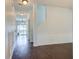 Hallway view of the living room and a sliding glass door to the backyard at 500 Dolphin Dr, Summerville, SC 29485