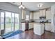 Eat-in kitchen with stainless steel appliances and sliding glass door access to the backyard at 500 Dolphin Dr, Summerville, SC 29485