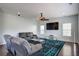 Bright living room with hardwood floors, modern furniture, and recessed lighting at 500 Dolphin Dr, Summerville, SC 29485