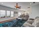 Living room with hardwood floors, ceiling fan, and a view into the kitchen at 500 Dolphin Dr, Summerville, SC 29485