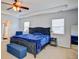 This main bedroom features a large bed, windows, and ceiling fan at 500 Dolphin Dr, Summerville, SC 29485