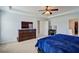A view of the main bedroom's dresser, television, and bathroom entrance at 500 Dolphin Dr, Summerville, SC 29485