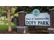 Welcome sign for Doty Park in the Town of Summerville, featuring brick pillars and lush greenery at 5024 Scow Ct, Summerville, SC 29485