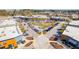 Aerial view of a busy commercial area with various stores and a large parking lot, showcasing a bustling retail center at 5031 Scow Ct, Summerville, SC 29485