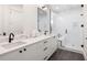 The bathroom includes dual sinks, a glass shower, and modern fixtures, providing both style and functionality at 508 Helmsman St, Charleston, SC 29492