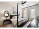The inviting bedroom features a four-poster bed, soft lighting, and light-blocking curtains for restful nights at 508 Helmsman St, Charleston, SC 29492