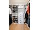 This well-organized walk-in closet with custom shelving and drawers maximizes space and convenience at 508 Helmsman St, Charleston, SC 29492