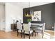 Dining room featuring modern lighting, stylish decor, and hardwood floors at 508 Helmsman St, Charleston, SC 29492