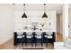 Sleek kitchen island with modern pendant lighting and barstool seating at 508 Helmsman St, Charleston, SC 29492