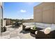 Private rooftop terrace offering ample seating, a dining area, and panoramic neighborhood views at 508 Helmsman St, Charleston, SC 29492