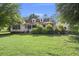 Charming home with a well-maintained front yard, inviting porch, and lovely curb appeal at 520 Givhans Rd, Ridgeville, SC 29472