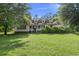 Charming single-Gathering home with a well-manicured front yard and covered front porch with dormers at 520 Givhans Rd, Ridgeville, SC 29472