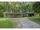 Large outdoor garage with multiple stalls offers ample parking and storage space at 520 Givhans Rd, Ridgeville, SC 29472
