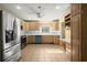 Bright kitchen with stainless steel appliances, plenty of cabinets, and tile floors at 520 Givhans Rd, Ridgeville, SC 29472