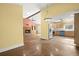 Open floor plan connecting the living room with fireplace and modern kitchen at 520 Givhans Rd, Ridgeville, SC 29472