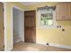 Mud room with laundry hookups, window, and entry to staircase at 520 Givhans Rd, Ridgeville, SC 29472
