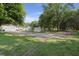 Large property with sheds and homes surrounded by trees at 520 Givhans Rd, Ridgeville, SC 29472