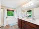 Bright bathroom featuring double vanity, soaking tub and tile floors at 521 Sanders Farm Ln, Wando, SC 29492