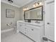 Bright bathroom featuring a double sink vanity with modern fixtures, a toilet, and marble floors at 521 Yellow Tower Ter, Charleston, SC 29412