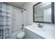 Bathroom featuring a shower/tub combo with white subway tile and a gray vanity at 521 Yellow Tower Ter, Charleston, SC 29412