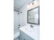 Bathroom featuring a shower/tub combo with white subway tile and a gray vanity at 521 Yellow Tower Ter, Charleston, SC 29412