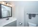 Charming bathroom with a vanity, decorative mirror and stylish lighting and hardware at 521 Yellow Tower Ter, Charleston, SC 29412