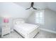 Bright bedroom featuring a charming white bed frame, patterned bedding, and natural light from the window at 521 Yellow Tower Ter, Charleston, SC 29412