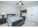 Bedroom featuring a queen bed, closet, plus a TV mounted on the wall at 521 Yellow Tower Ter, Charleston, SC 29412