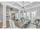 Dining area featuring coffered ceilings, wainscoting, and stylish decor at 521 Yellow Tower Ter, Charleston, SC 29412