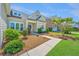 Charming home with lush landscaping, and inviting front entrance and a well-manicured lawn at 521 Yellow Tower Ter, Charleston, SC 29412