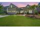 Charming home with a two-car garage, manicured lawn, and inviting front porch at 521 Yellow Tower Ter, Charleston, SC 29412