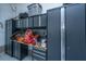 Functional garage space with ample storage cabinets and organized equipment, perfect for projects at 521 Yellow Tower Ter, Charleston, SC 29412
