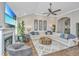 Comfortable living room with a fireplace, large sectional sofa, hardwood floors, and vaulted ceilings at 521 Yellow Tower Ter, Charleston, SC 29412