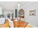Dining table with view of the kitchen and living spaces, with coffee bar at 522 Antebellum Ln, Mount Pleasant, SC 29464