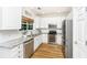Modern kitchen with stainless steel appliances, granite countertops, and ample cabinet space at 522 Antebellum Ln, Mount Pleasant, SC 29464