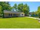 This home features a well-manicured lawn and a charming front exterior at 523 Bayshore Blvd, Goose Creek, SC 29445