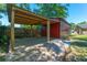The shed features a covered outdoor seating or storage area at 523 Bayshore Blvd, Goose Creek, SC 29445