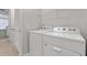 Laundry room equipped with white washer and dryer at 525 Purple Finch Rd, Summerville, SC 29486
