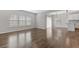 Spacious living room featuring hardwood floors and an abundance of natural light at 525 Purple Finch Rd, Summerville, SC 29486